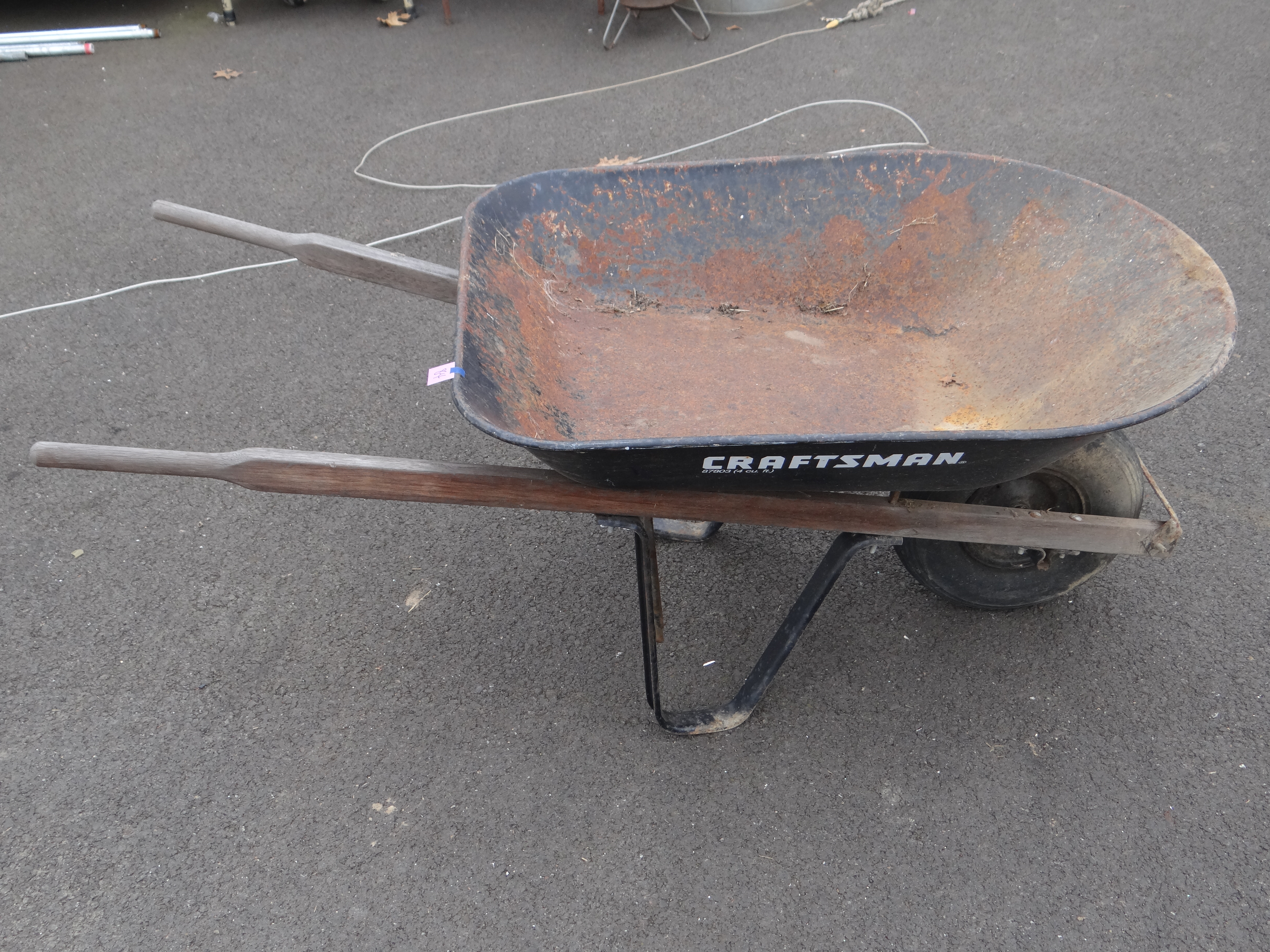 84-Craftsman Wheelbarrow (rusted holes, see pics)